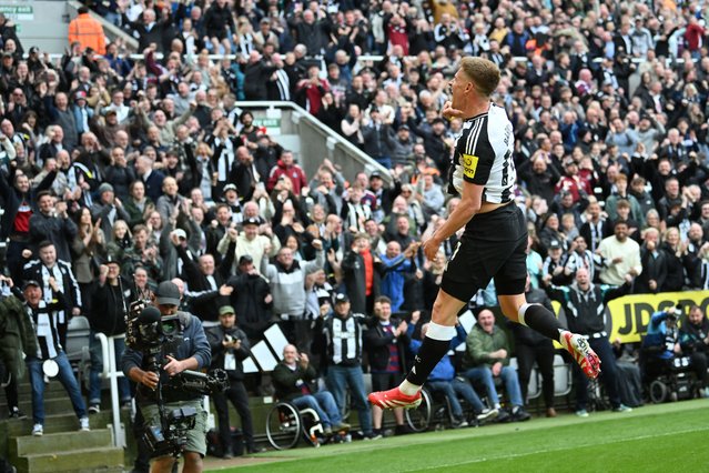 Newcastle United's English midfielder #11 Harvey Barnes celebrates after scoring their third goal during the English Premier League football match between Newcastle United and Manchester United at St James' Park in Newcastle-upon-Tyne, north east England on April 13, 2025. (Photo by Andy Buchanan/AFP Photo)
