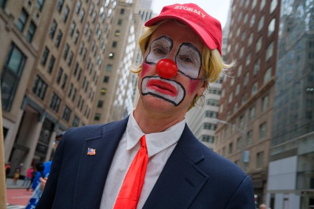 Demonstrators march through Manhattan on April 19, 2025 as part of a nationwide “hands off” protest against Trump-era policies, rallying under the themes hands off migrants and hands off the planet. (Photo by Milo Hess/ZUMA Press Wire/Alamy Live News)