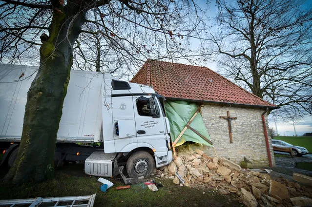 A truck crashed into the St. Anthony' s Chapel at Horstmar, Germany, 03 January 2017. The chapel is in danger of collapsing. The truck went off the road after the grade, drove across the green area and crashed into the chapel. The police began the investigations. It is also being checked whether the wind was a cause for the crash and pressed on the truck. (Photo by Jens Keblat/DPA)