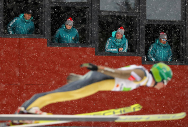 Judges watch Hannu Manninen of Finland in action at the 2017 FIS Nordic World Ski Championships in Lahti, Finland, on February 26, 2017. (Photo by Kai Pfaffenbach/Reuters)