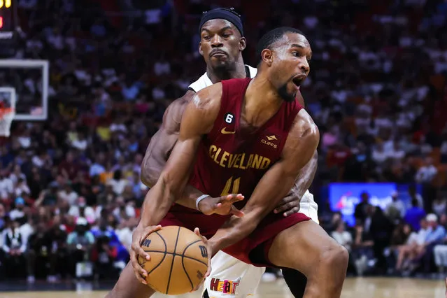 Evan Mobley #4 of the Cleveland Cavaliers drives against Jimmy Butler #22 of the Miami Heat during the first quarter of the game at Miami-Dade Arena on March 08, 2023 in Miami, Florida. (Photo by Megan Briggs/Getty Images)