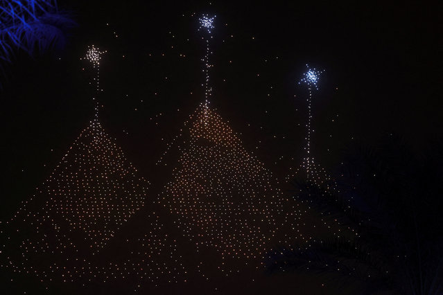 A drone light show depicts Egyptian pyramids during the opening ceremony of the Grand Egyptian Museum (GEM), near the Giza pyramid complex, in Giza, Egypt, on November 1, 2025. (Photo by Mohamed Abd El Ghany/Reuters)