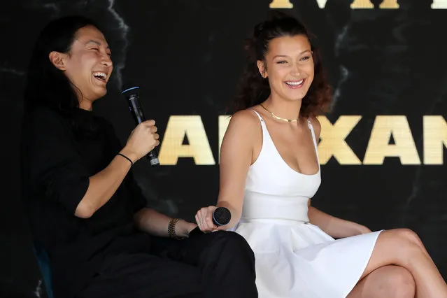 Alexander Wang an Bella Hadid speak at the Magnum photocall during the 71st annual Cannes Film Festival at Magnum Beach on May 10, 2018 in Cannes, France. (Photo by Andreas Rentz/Getty Images)
