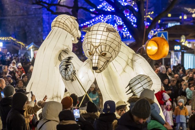 Artists of the Remue Menage company from France perform a show called Gueules d'Ours (Bear Mouths) during the 10th edition of Bo Noel, in Lausanne, Switzerland, 28 December 2024. (Photo by EPA/EFE)