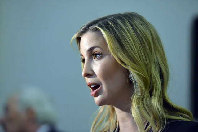 Ivanka Trump talks with the media after part of her family staged an architectural and design unveiling of the planned Trump International Hotel at the Old Post Office on Tuesday, September 10, 2013, in Washington, DC. (Photo by Jahi Chikwendiu/The Washington Post)