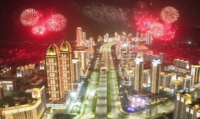 A photo released by the official North Korean Central News Agency (KCNA) shows a fireworks display during an inauguration ceremony for 10,000 new flats in the Hwasong area in Pyongyang, North Korea, 16 April 2023. According to KCNA, the ceremony was held “with splendor” one day after the 111th birth anniversary of the late North Korean founder Kim Il-sung, adding to the celebrations of the national holiday, also known as the “Day of the Sun”. (Photo by KCNA/EPA/EFE)