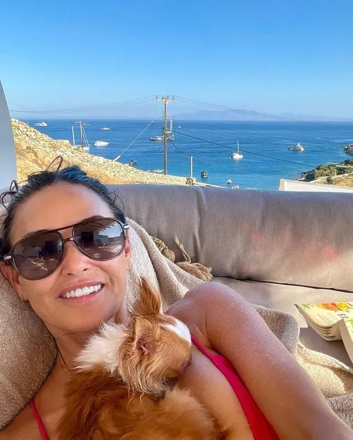 American actress Demi Moore in the first decade of August 2023 enjoys “basking in the sun” with her pup, Pilaf. (Photo by demimoore/Instagram)