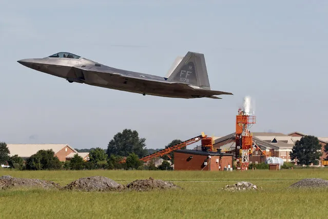 An F-22 departs Langley Air Force Base, Va., Tuesday morning, September 11, 2018, as Hurricane Florence approaches the Eastern Seaboard. Officials from Joint Base Langley-Eustis in Hampton said the base's F-22 Raptors and T-38 Talon training jets, as a precaution, were headed for Rickenbacker Air National Guard Base in central Ohio. (Photo by Jonathon Gruenke/The Daily Press via AP Photo)