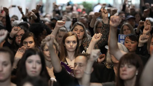 Hundreds of protesters rally in the Hart Senate Office Building while demonstrating against the confirmation of Supreme Court nominee Judge Brett Kavanaugh on Capitol Hill September 24, 2018 in Washington, DC. Hundreds of people from half a dozen progressive organizations, including students from Yale University Law School, protested on Capitol Hill for a #BelieveSurvivors Walkout against Judge Kavanaugh, who has been accused by at least two women of sexual assault. (Photo by Chip Somodevilla/Getty Images)
