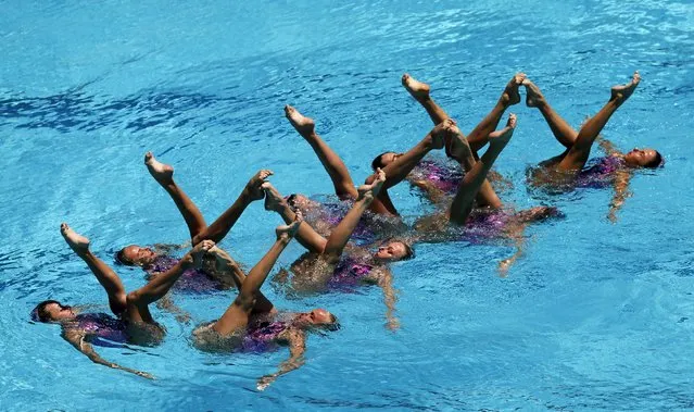 The team from Ukraine performs their Free Routine during the Synchronized Swimming Olympic Games Qualification Tournament at the Maria Lenk Aquatics Center in Rio de Janeiro, Brazil on March 6, 2016. (Photo by Sergio Moraes/Reuters)