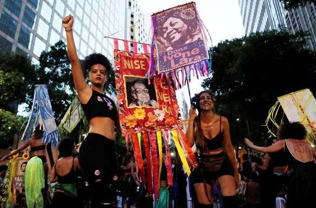 Women participate in a rally during Women's Day celebrations in Rio de Janeiro, Brazil on March 8, 2019. (Photo by Sergio Moraes/Reuters)