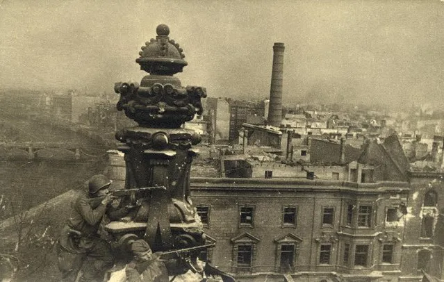 Russian soldiers are pictured on top of the Reichstag building in this undated photo taken May 1945 in Berlin. (Photo by Georgiy Samsonov/Reuters/MHM)