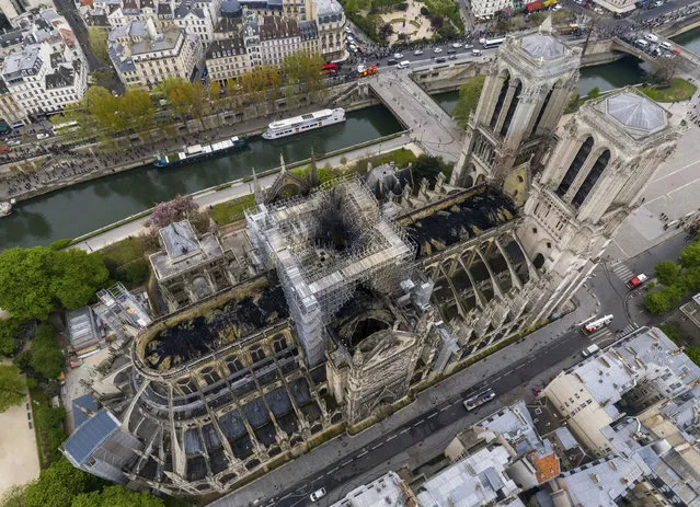 An image made available by Gigarama.ru on Wednesday April 17, 2019 shows an aerial shot of the fire damage to Notre Dame cathedral in Paris on Tuesday April 16. Nearly $1 billion has already poured in from ordinary worshippers and high-powered magnates around the world to restore Notre Dame Cathedral in Paris after it was damaged in a massive fire on Monday. (Photo by Gigarama.ru via AP Photo)