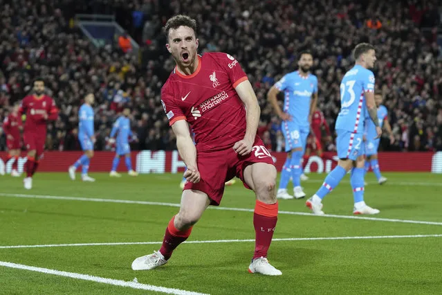 Liverpool's Diogo Jota celebrates after scoring his side's first goal during the Champions League group B soccer match between Liverpool and Atletico Madrid in Liverpool, England, Wednesday, November 3, 2021. (Photo by Jon Super/AP Photo)