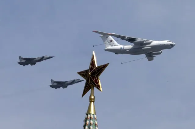 A Russian Il-78 Midas air force tanker and Su-24 jets fly in formation during the Victory Day parade above Red Square in Moscow, Russia, May 9, 2015. (Photo by Tatyana Makeyeva/Reuters)