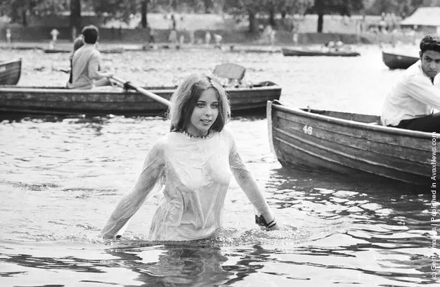A teenage girl cooling off in the Serpentine during the Rolling Stones concert in Hyde Park, London, 5th July 1969