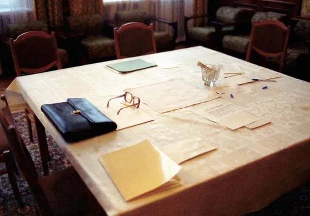 A table with some documents and glasses are seen after the signing of an agreement terminating the Soviet Union and declaring the creation of the Commonwealth of Independent States in Viskuli, Belarus, on December 8, 1991. The agreement by the leaders of the Soviet republics of Russia, Ukraine and Belarus dealt the final, deadly blow to the USSR. (Photo by Yuri Ivanov/AP Photo/File)