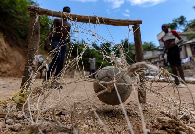Youths play soccer in the Petion-Ville neighborhood of Port-au-Prince, Haiti, Sunday, April 21, 2024. (Photo by Ramon Espinosa/AP Photo)