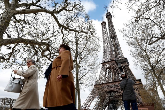 “Eiffela”, a replica of the famous Parisian Tower, ten times smaller than its model and created by Philippe Maindron and is pictured near the original one in Paris, France, April 3, 2023. (Photo by Benoit Tessier/Reuters)