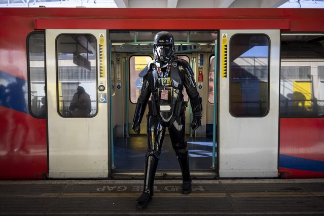 A Star Wars fan dressed as an Imperial Death Trooper arrives at ExCeL convention centre to attend Star Wars Celebration event in London, Britain on April 7, 2023. Star Wars Celebration is an international annual event that sees major announcements, cast guests, panels and merchandise trading that runs between 7 and 10 April. (Photo by Tolga Akmen/EPA/EFE)