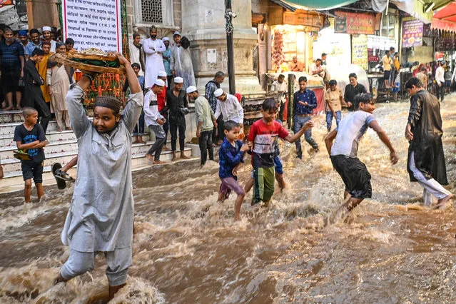 Heavy rainfall in Rajasthan's Ajmer district led to waterlogging in the Dargah area and caused disruption in the lives of common people in Ajmer on July 12, 2022. (Photo by Shaukat Ahmed/Pacific Press/Rex Features/Shutterstock)