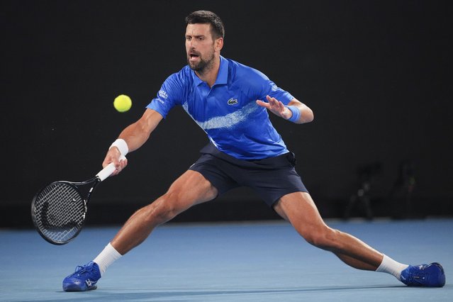 Serbia's Novak Djokovic plays a forehand return to Germany's Alexander Zverev during an exhibition match ahead of the Australian Open tennis championship in Melbourne, Australia, Thursday, January 9, 2025. (Photo by Vincent Thian/AP Photo)