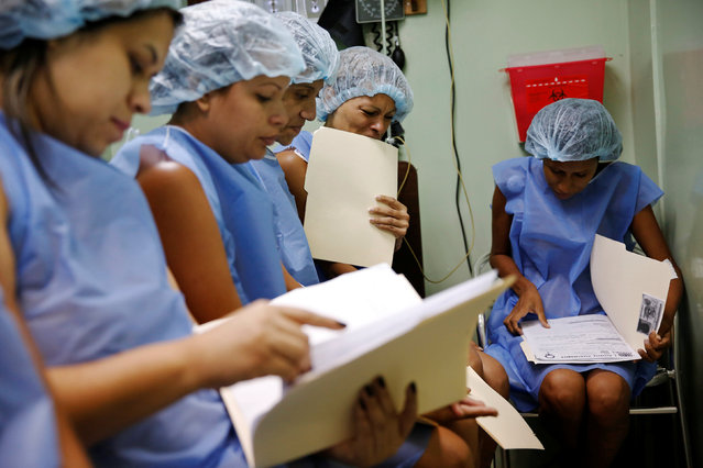Women wait for sterilization surgery at a hospital in Caracas, Venezuela July 27, 2016. (Photo by Carlos Garcia Rawlins/Reuters)