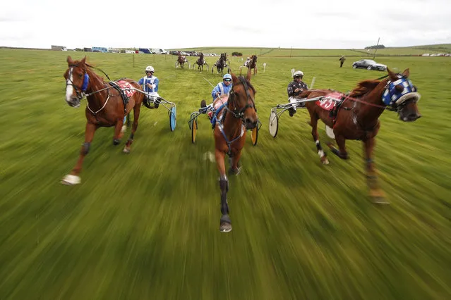 Behind the pacer car at the start at Pikehall harness racing course on June 11, 2017 in Matlock, England. (Photo by Alan Crowhurst/Getty Images)
