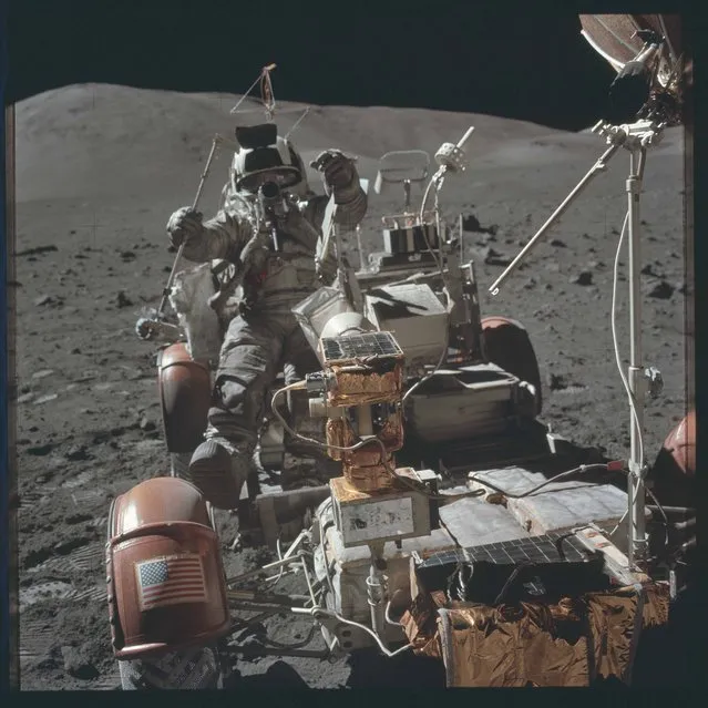 Scientist-astronaut Harrison H. Schmitt is photographed seated in the Lunar Roving Vehicle (LRV) at Station 9 (Van Serg Crater) during the third Apollo 17 extravehicular activity (EVA) at the Taurus-Littrow landing site during the Apollo 17 mission in this December 13, 1972 NASA handout photo. (Photo by Reuters/NASA)
