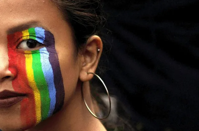 A participant with a painted face takes part in Delhi Queer Pride March, an event promoting gay, lesbian, bisexual and transgender rights, in New Delhi, India on January 8, 2023. (Photo by Adnan Abidi/Reuters)