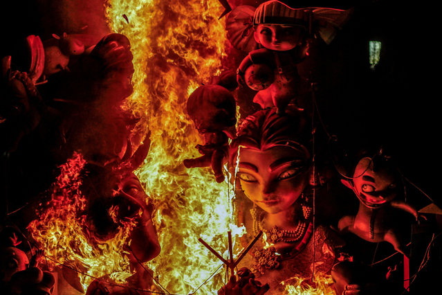 Fallas sculptures burn in fire during the development of the last day of Fallas 2024. The final touch of the Fallas festival took place in the city of Valencia, Spain on March 19, 2024, with more than 1 million tourists and more than 700 fellas that were exposed in different parts of the city. (Photo by Cristobal Basaure Araya/SOPA Images/Rex Features/Shutterstock)