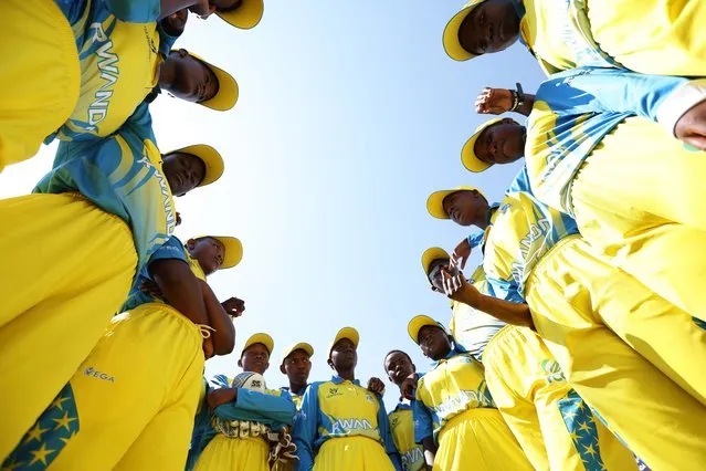Players of Rwanda huddle during the ICC Women's U19 T20 World Cup 2023 match between England and Rwanda at North-West University Oval on January 19, 2023 in Potchefstroom, South Africa. (Photo by Nathan Stirk-ICC/ICC via Getty Images)
