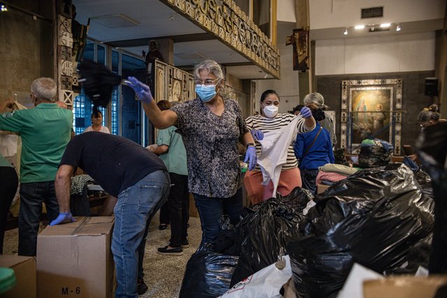 People organize donations for those affected by heavy rains, in Maracaibo, Venezuela, 30 June 2025. Venezuelan authorities have organized health days in regions of the west of the country, while the church leads the collection of food, medicines, clothing and other items. (Photo by Miguel Gutierrez/EPA)
