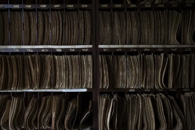 Medical and X-ray files are stored in the radiology department of Yangjia Hospital in Wuyi County, Zhejiang Province, China October 19, 2015. (Photo by Damir Sagolj/Reuters)