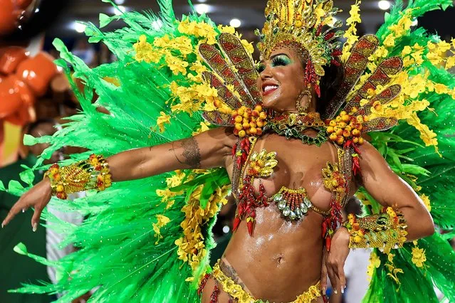 A member of Mocidade performs during 2023 Carnival parades at Marquês de Sapucaí Sambodrome on February 19, 2023 in Rio de Janeiro, Brazil. (Photo by Buda Mendes/Getty Images)