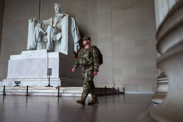 National Guard members walk past the Lincoln Memorial while patrolling the National Mall, on September 04, 2025 in Washington, DC. Members of the National Guard and Federal Law Enforcement continue to patrol the Nation's Capital, weeks after U.S. President Donald Trump ordered the National Guard and law enforcement to patrol the nation's capital to assist in crime prevention with more than 2,200 National Guard troops have been deployed in Washington, D.C., a mission that experts estimate is costing over $1 million a day when factoring in pay, housing, travel, food, fuel and other logistics, according to comparisons with the 2020 mobilization of 5,000 Guard members that cost more than $2 million daily. (Photo by Kent Nishimura/Getty Images)