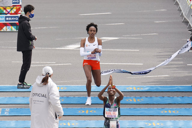 Ethiopian athlete Tsehay Gemechu crosses the finish line in second place of the women's race during the Tokyo Marathon 2023 in Tokyo on March 5, 2023. (Photo by Rodrigo Reyes Marin/Pool via AFP Photo)
