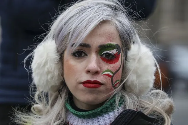 A woman is seen as people gather around the Freedom Plaza to march in support of the demonstrations that started following the death of Mahsa Amini in Iran, on March 11, 2023 in Washington, United States. (Photo by Celal Gunes/Anadolu Agency via Getty Images)