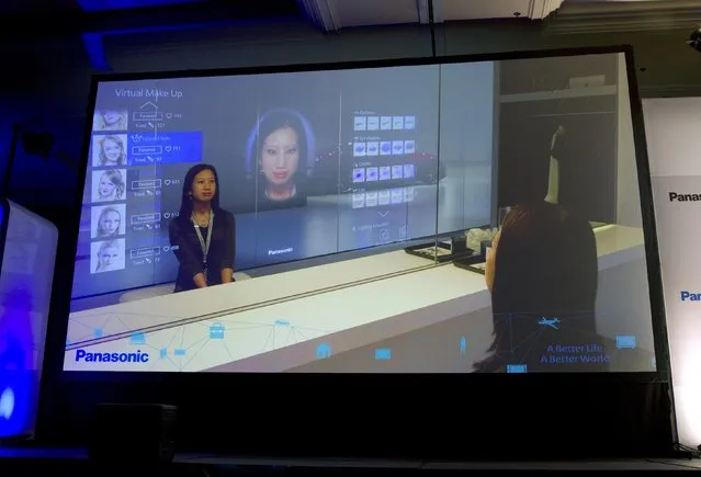 A display shows Panasonic's virtual make-up mirror at a Panasonic news conference during the 2015 International Consumer Electronics Show (CES) in Las Vegas, Nevada January 5, 2015. The technology will allow users to try out different looks without actually putting make-up on their face. (Photo by Steve Marcus/Reuters)