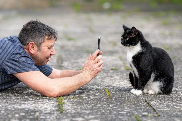 Gavin Dalley from Somerset, with his pet cat Elsa on April 21, 2023, who it's been announced, is a finalist in the “Social Star” category of this year's Cats Protection National Cat Awards. (Photo by PA Wire Press Association)