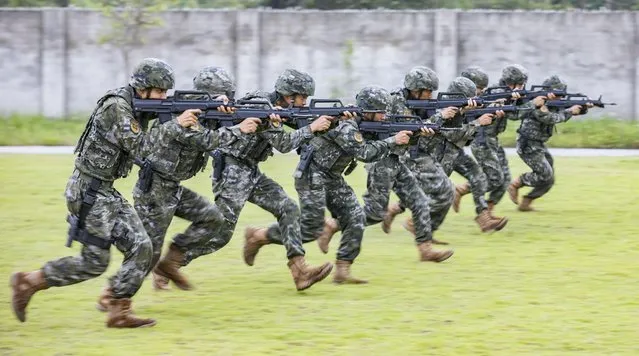 Armed police officers conduct shooting training in Qinzhou, South China's Guangxi Zhuang Autonomous region, May 24, 2023. (Photo by Costfoto/NurPhoto via Getty Images)