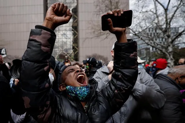 A person reacts after the verdict in the trial of former Minneapolis police officer Derek Chauvin, found guilty of the death of George Floyd, in front of Hennepin County Government Center, in Minneapolis, Minnesota, April 20, 2021. (Photo by Carlos Barria/Reuters)