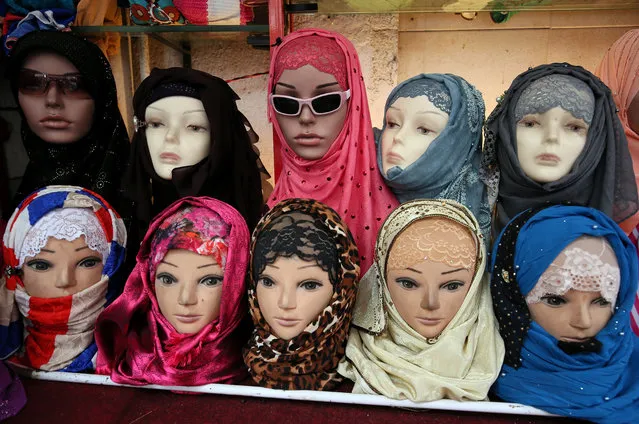 Mannequins displaying hijabs are pictured at a shop in Mumbai, September 19, 2018. (Photo by Francis Mascarenhas/Reuters)