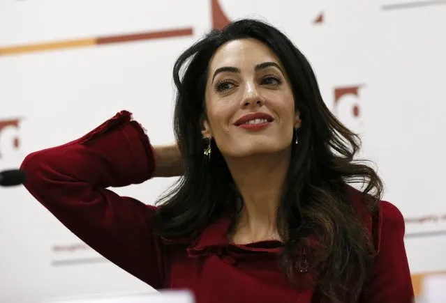 Lawyer Amal Clooney reacts during a news conference for Mohamed Nasheed, in central London, Britain January 25, 2016. Former president of the Maldives, Nasheed, freed from jail last week to seek medical care in Britain, called on Monday for sanctions against Maldivian government figures as his lawyer warned a militant attack on tourists was highly likely. (Photo by Stefan Wermuth/Reuters)