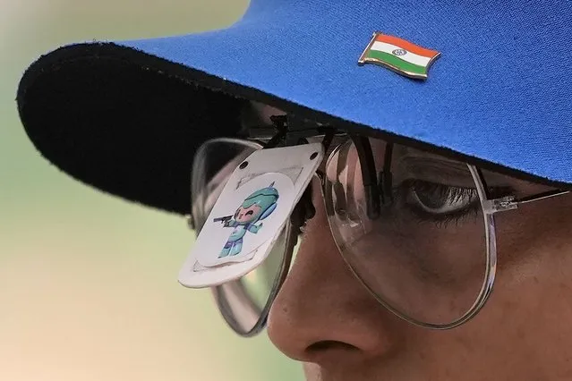 India's Divya Thadigol Subbaraju wears a sticker on her blinder showing an Asian Games mascot, as she prepares to shoot during the Shooting 10m Air Pistol Mixed Team gold medal match against China for the 19th Asian Games in Hangzhou, China, Saturday, September 30, 2023. (Photo by Ng Han Guan/AP Photo)