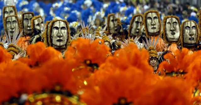 Revellers parade for the Imperio de Casa Verde samba school during the carnival in Sao Paulo, Brazil, February 6, 2016. (Photo by Paulo Whitaker/Reuters)