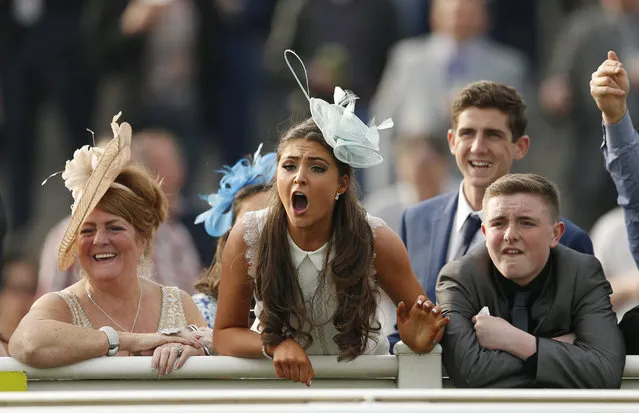 Horse Racing – Crabbie's Grand National Festival – Aintree Racecourse April 10, 2015: Racegoers react during the 17.15 Weatherbys Wealth Management Champion Standard Open National Hunt Flat Race. (Photo by Andrew Boyers/Reuters)