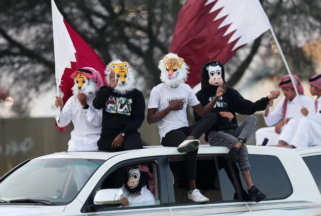 Qatari soccer fans celebrate, after winning the AFC Asian Cup, at the Doha Corniche in Doha, Qatar February 2, 2019. (Photo by Ibraheem al Omari/Reuters)