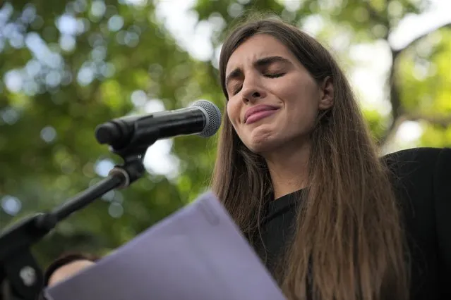 Camilla Fabri, the wife of Colombian businessman Alex Saab who has been recently extradited to the U.S., reads a letter sent to her by her husband, during a demonstration demanding his release, in Caracas, Venezuela, Sunday, October 17, 2021. Saab, a close ally of Venezuela's President Nicolas Maduro, who prosecutors in the U.S. believe could be the most significant witness ever about corruption in the South American country, was extradited from Cabo Verde and is now in U.S. custody. (Photo by Ariana Cubillos/AP Photo)