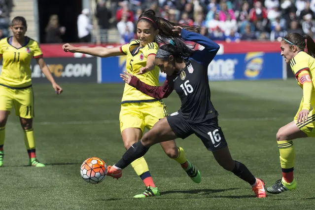 In this April 10, 2016, file photo, Colombia's Isabella Echeverri (5) battles for the ball against United States' Crystal Dunn (16) during the first half of an international friendly soccer match in Chester, Pa. Colombian women’s national team players Isabella Echeverri and Melissa Ortiz are speaking out on social media about what they say are substandard conditions and discriminatory treatment by the federation. (Photo by Chris Szagola/AP Photo)